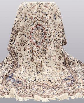 A carpet, Nain part silk, 361 x 262 cm.