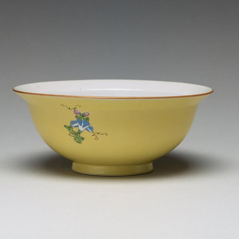 A yellow glazed sgrafitto bowl, late Qing dynasty with Qianlong mark.