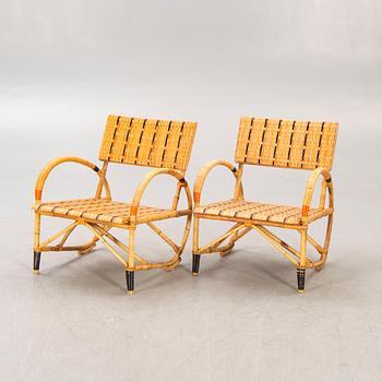 Armchairs a pair and table, 1930s-40s.