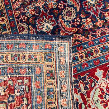 A carpet, a semi-antique Tabriz, ca 357 x 255 cm.