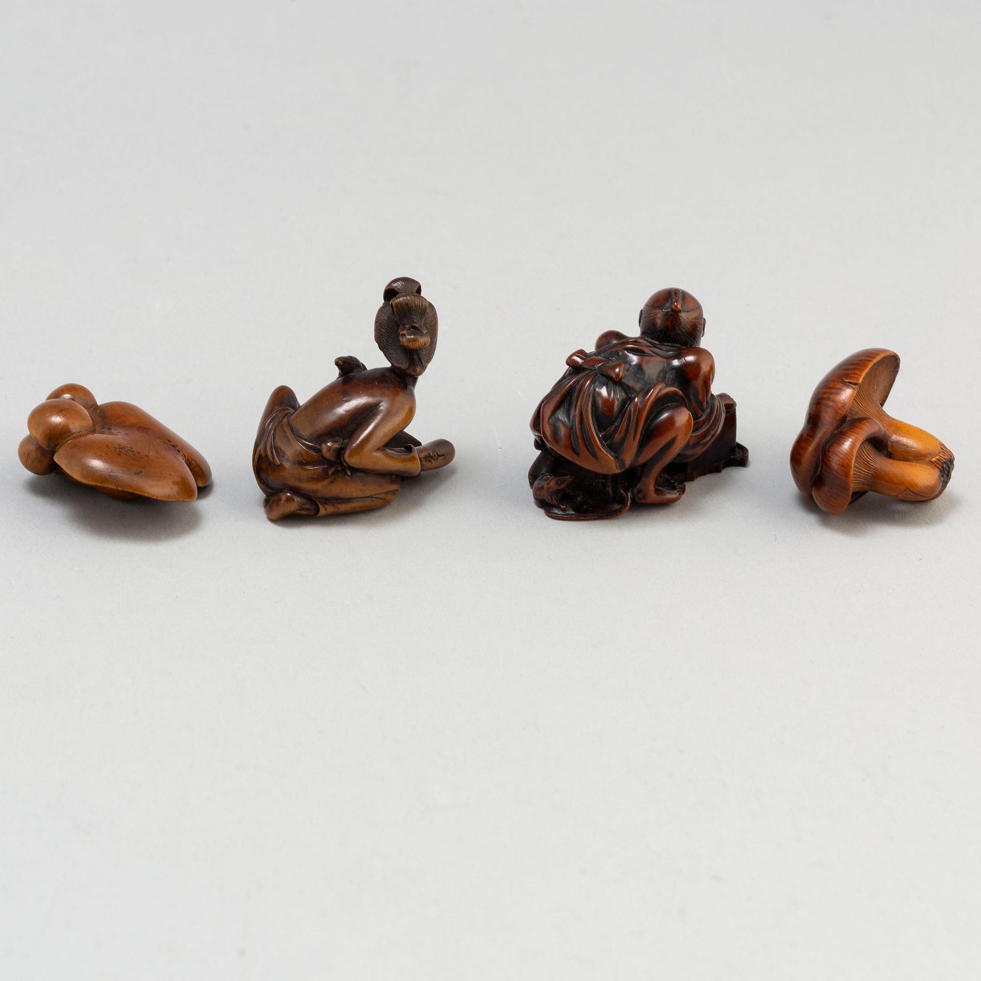 Four Japanese wooden Netsukes, Meiji (1868-1912).