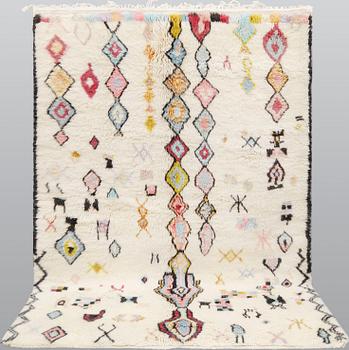 A Moroccan rug, approx. 253 x 166 cm.