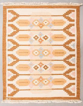 A flat weave carpet signed ILS, Alestalon Mattokutomo, Kauhava, Finland. ca 197x139 cm.