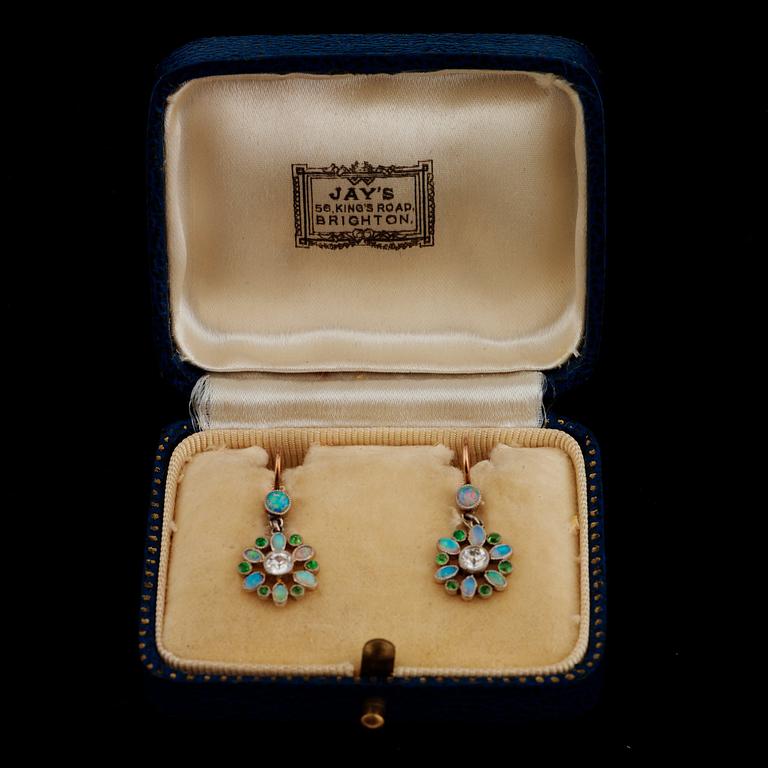 A pair of opal earrings set with demantoid garnets and old-cut diamonds.