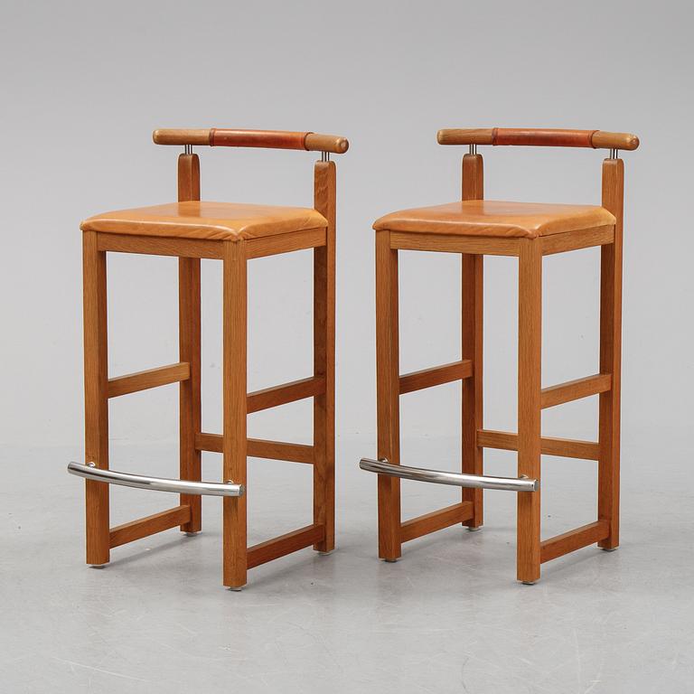A pair of 1980's bar stools.
