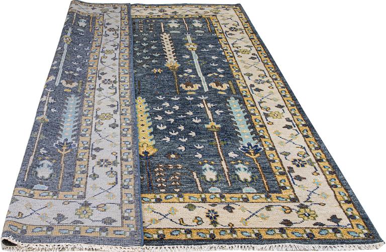 A carpet, oriental, ca 303 x 235 cm.