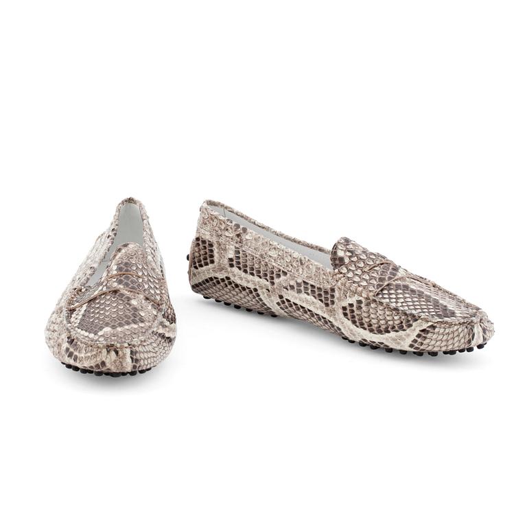 TOD'S, a pair of leather embossed loafers.