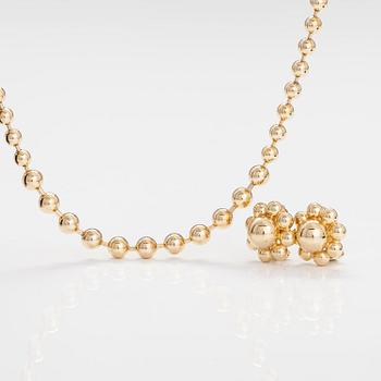 DIOR. A necklace and a pair of earrings in gold coloured metal. Marked Chr. Dior, Germany.