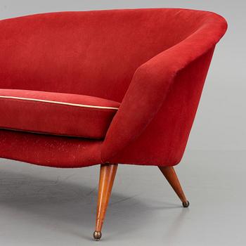 A 1950s 'Tellus' sofa by Folke Jansson.