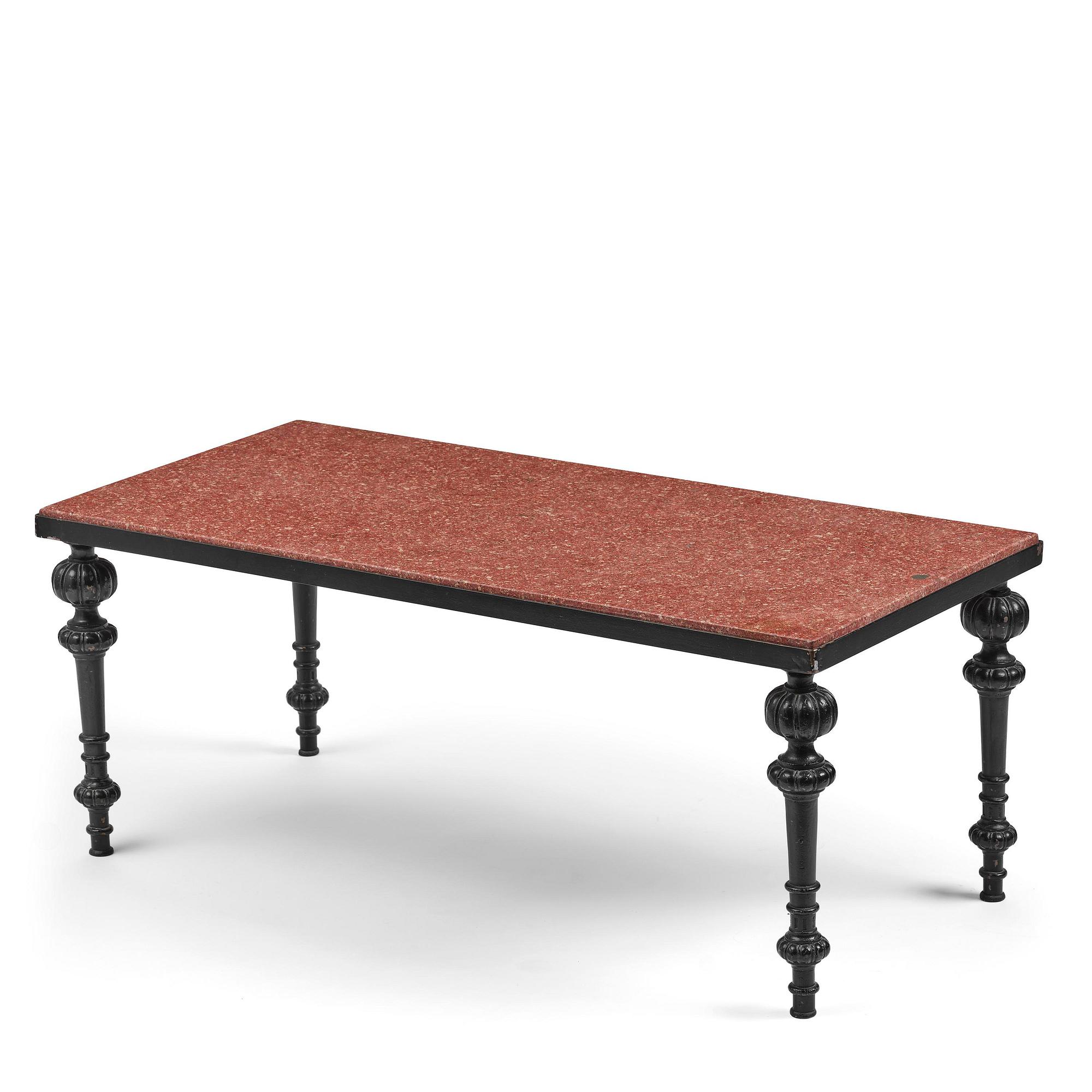 A table with granite stone top from Älvdalen, first part 19th century on a later metal stand.