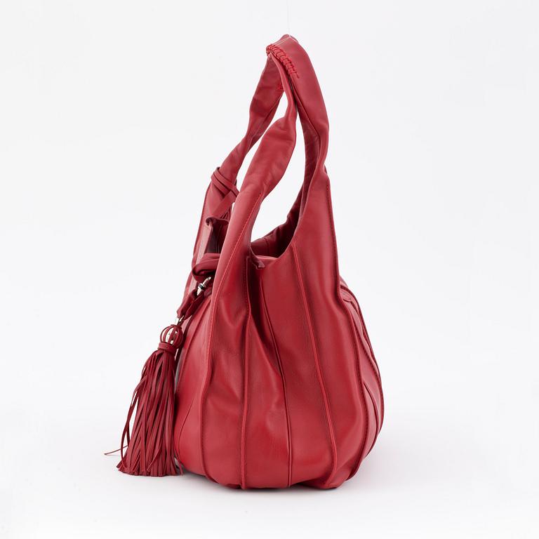 LANCEL, a red leather shoulder bag.