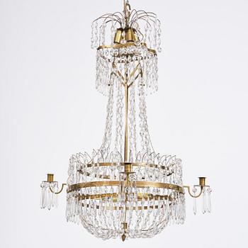 A late-Gustavian five-light gilt brass and cut glass chandelier, Stockholm, circa 1800.