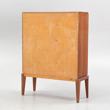 Erik Mattsson, cabinet, "Stockholm,"  executed by Birger Ekman, Mjölby Intarsia for AB Harry Carlsson Stockholm 1940s.