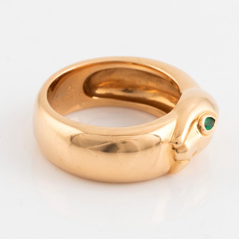 An 18K gold Cartier ring set with a tsavorite.