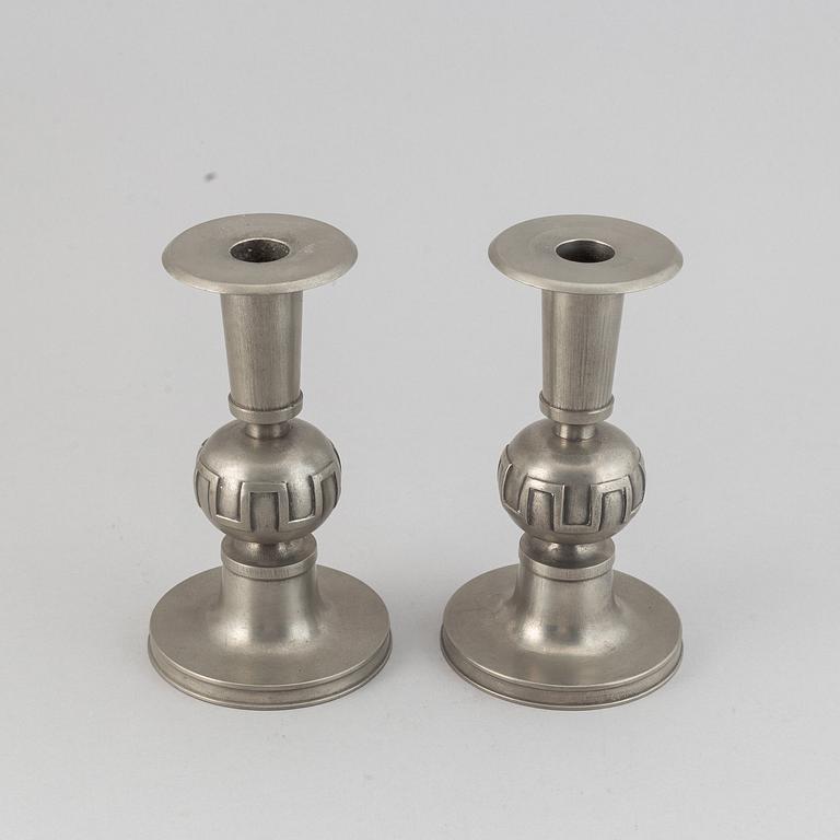 A pair of pewter candle holders by Edvin Ollers, 1952.