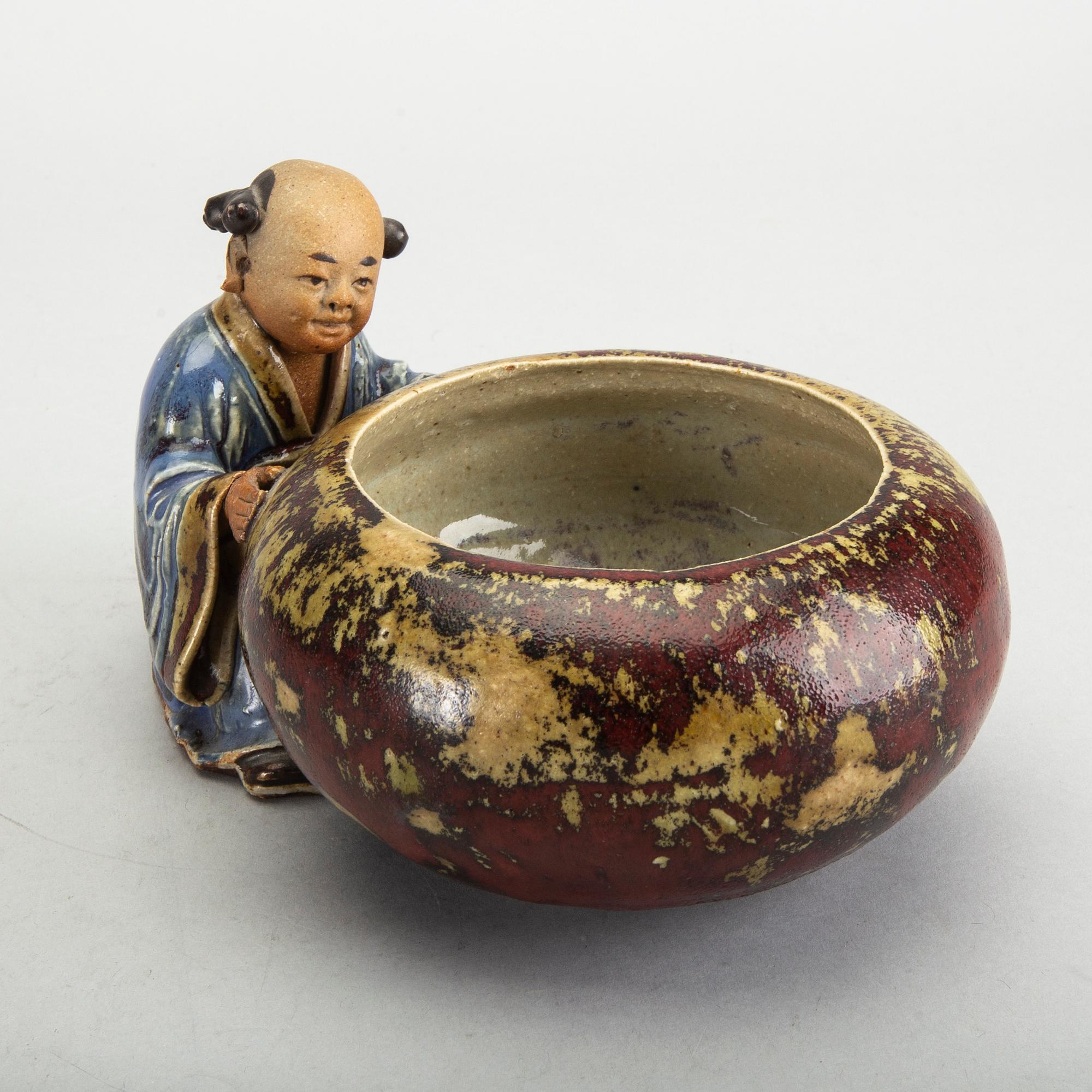 A Japanese 20th century signed porcelain figurine.
