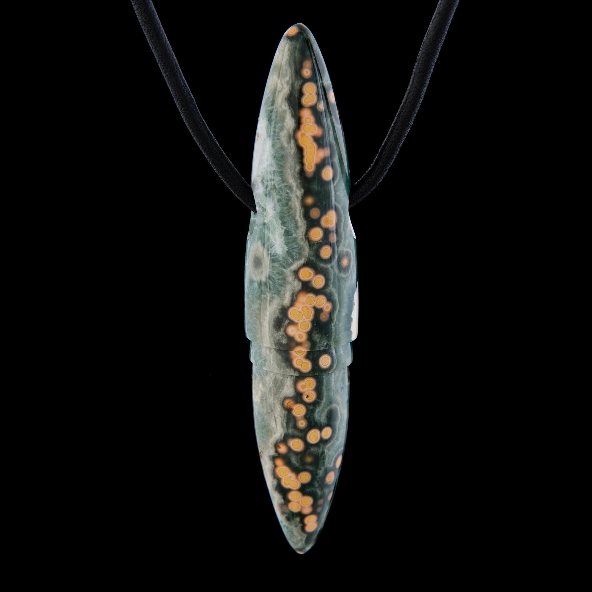 A BERND MUNSTEINER PENDANT, "Symbolon", cut jasper, leather.