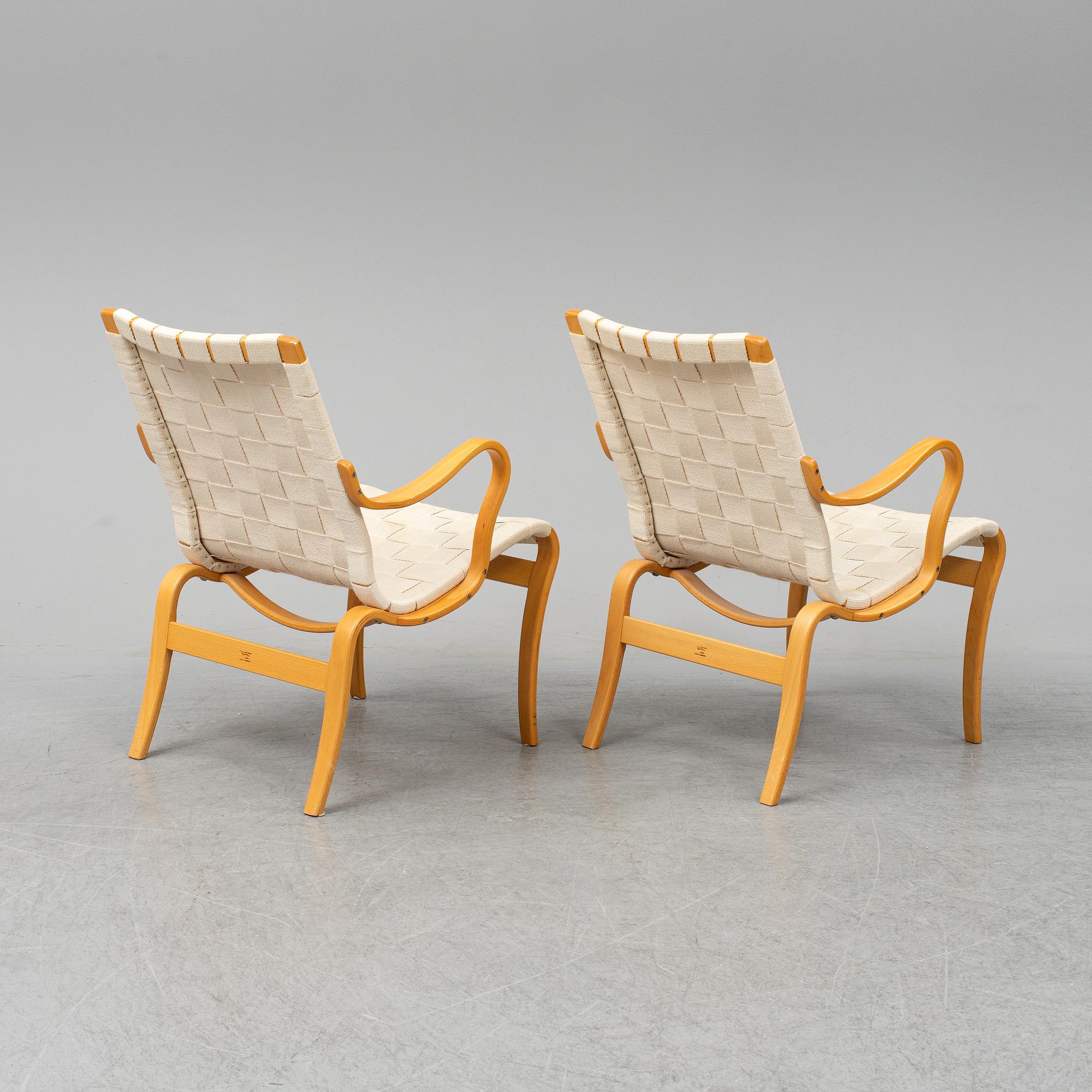 BRUNO MATHSSON, a pair of 'Mina' armchairs from Bruno Mathsson International, Värnamo, 1997.