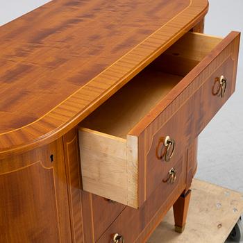 A mahogany veneered dresser, mid 20th Century.