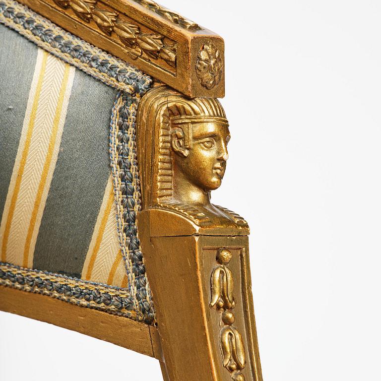 A pair of late Gustavian open armchairs attributed to E. Ståhl (master in Stockholm 1794-1820).