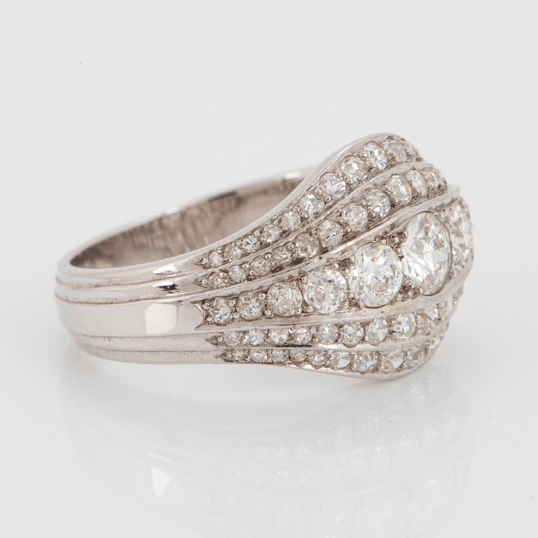 An 18K white gold ring set with old- and eight-cut diamonds.