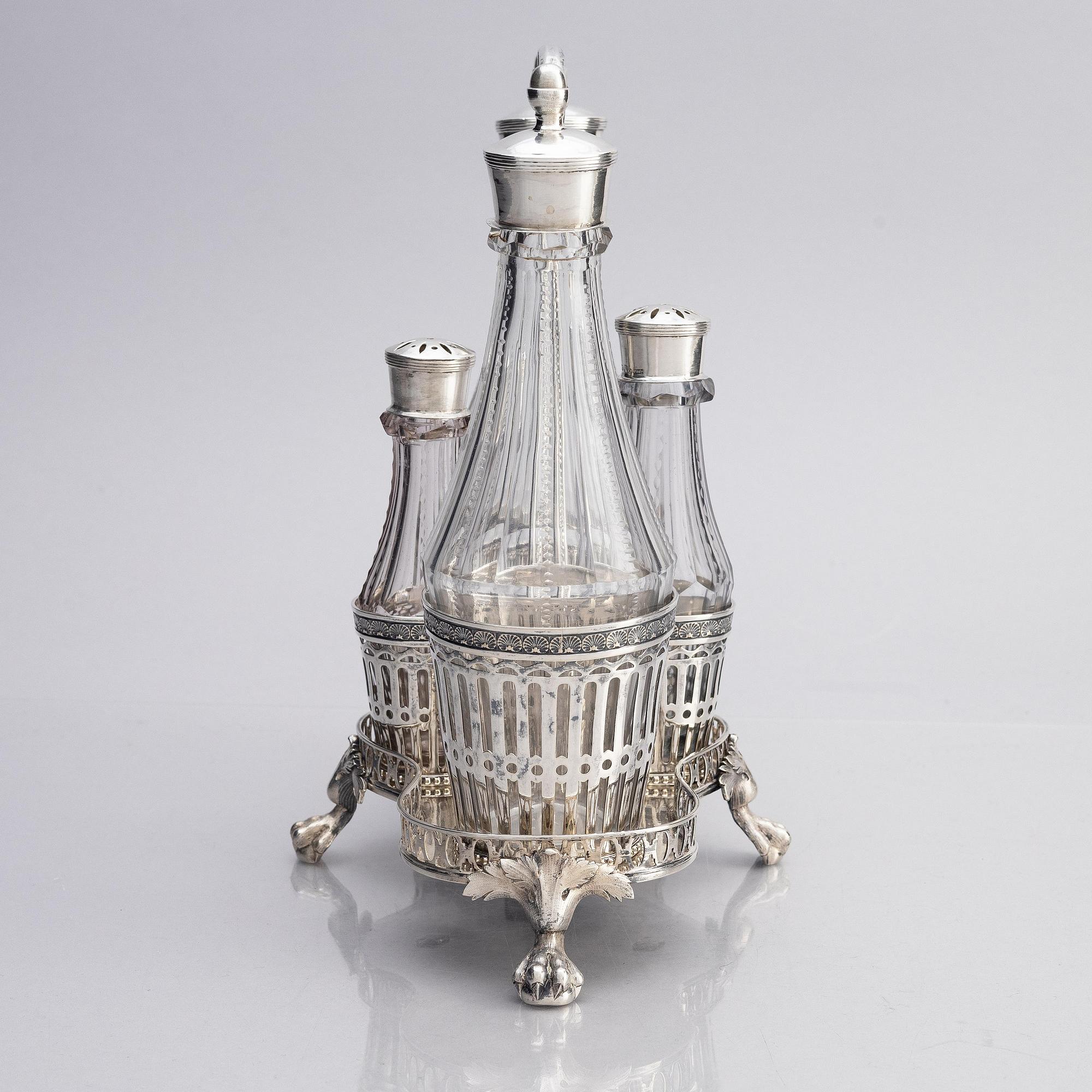 A Swedish 18/19th century silver and glass cruet-set, mark of Pehr Zethelius and Paul Wihlborg, Stockholm 1795 and 1814.