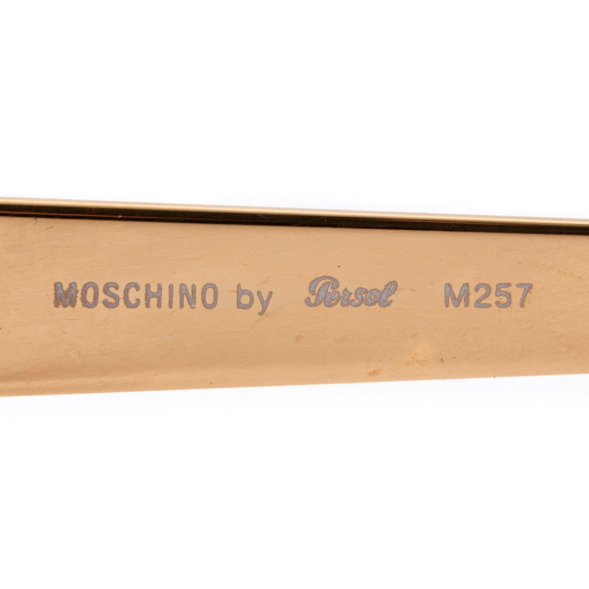 MOSCHINO, a pair of sunglasses.