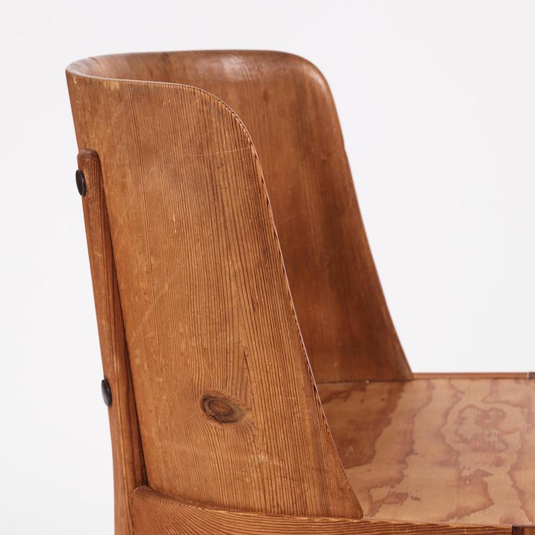 Axel Einar Hjorth, a pair of "Lovö" stained pine armchairs, Nordiska Kompaniet 1930s.