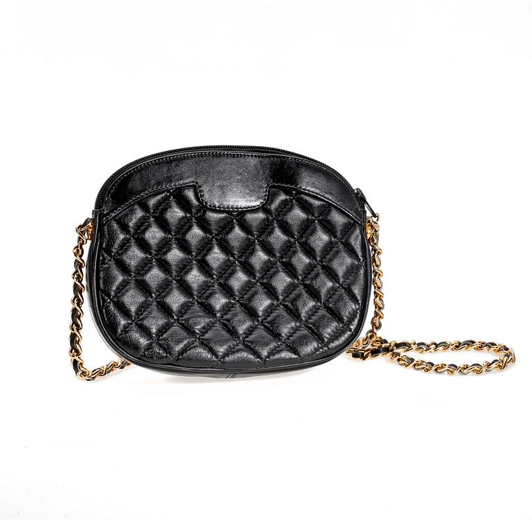 A black leather handbag by Louis Féraud.