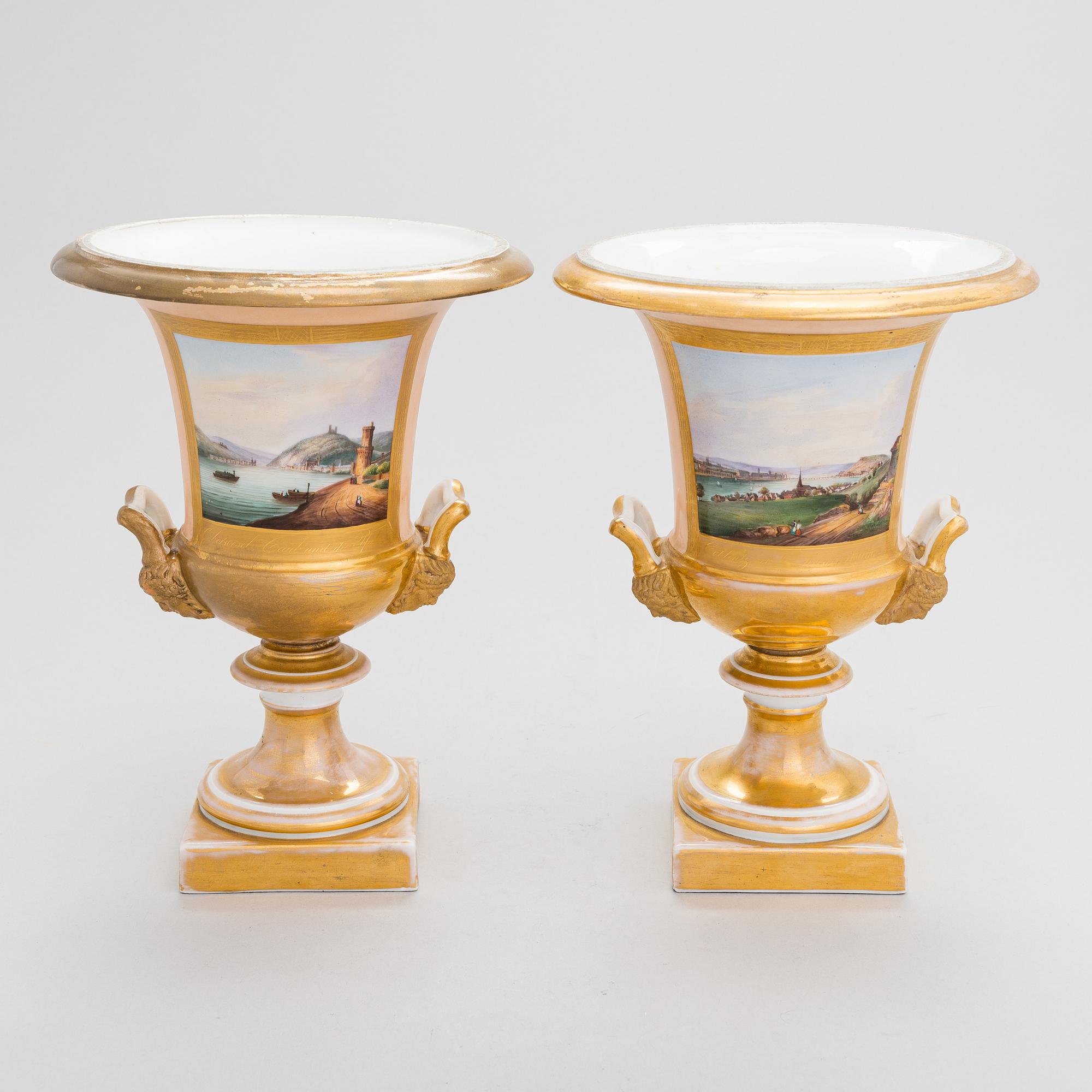 A pair of German porcelain urns from around the mid-19th century.
