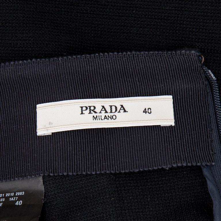 KJOL, Prada.