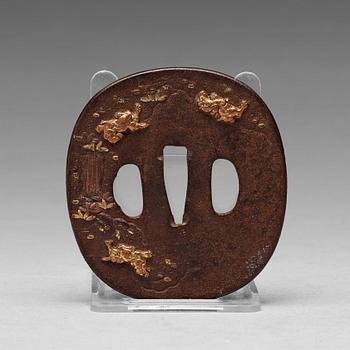 220. A Japanese bronze Tsuba, Edo period (1603-1868).