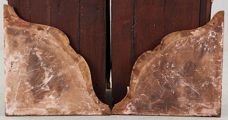 A pair of Louis XV 18th century corner cabinets by F. Reizell.