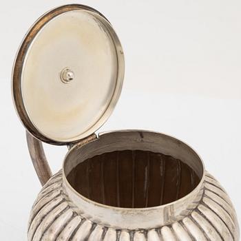 A silver teapot, bearing the mark of K. Andersson, Stcokholm, 1905.