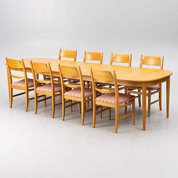 Carl Malmsten, a dining table with eight chairs, 'Camlare Nyckel', Sweden, second half of the 20th century.