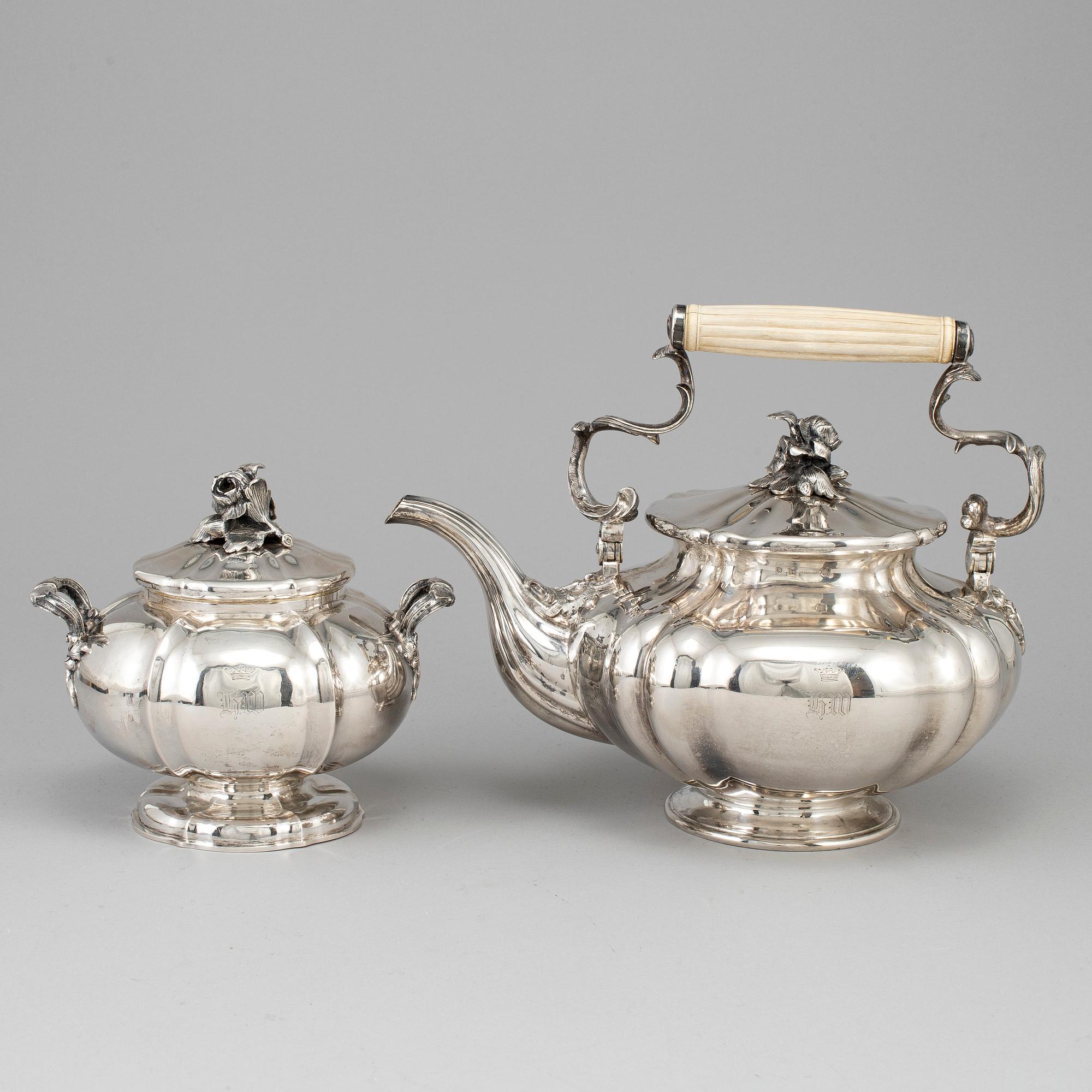 A silver teapot and sugar bowl, maker's mark of Carl Bojanowski, St. Petersburg 1851-57.