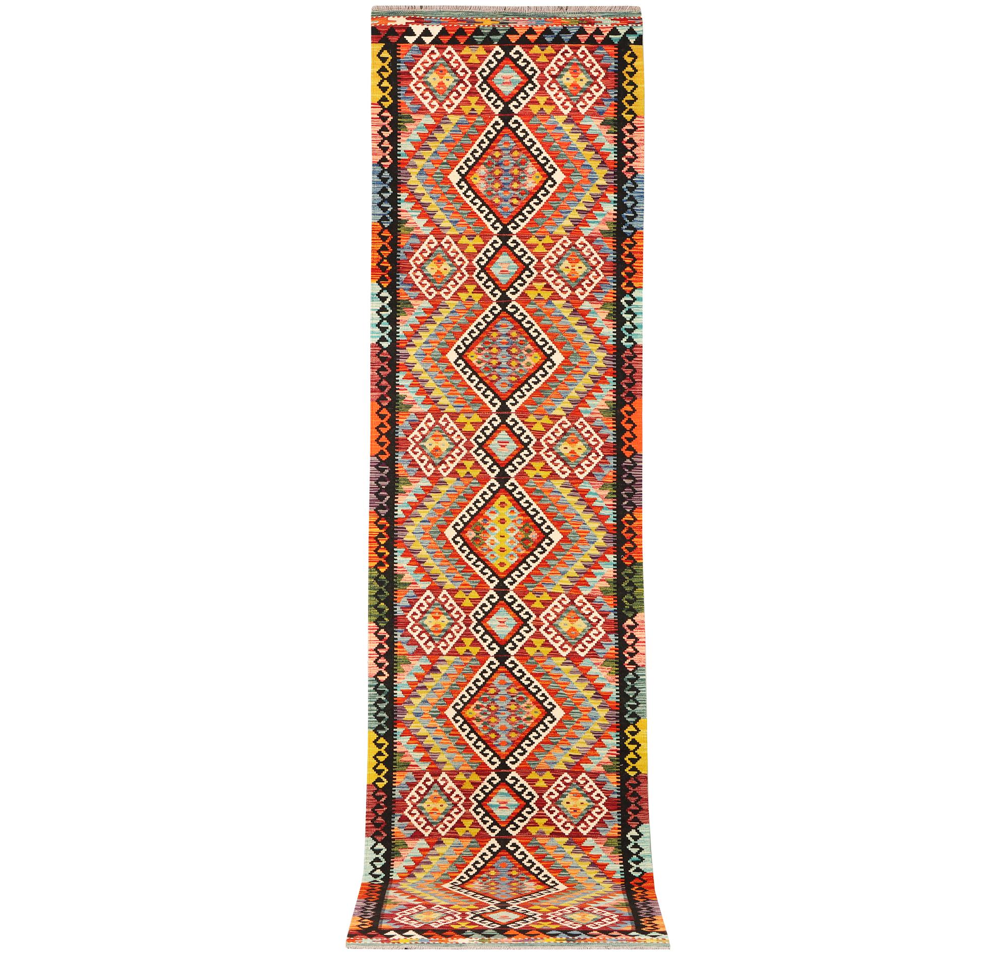 A Kilim runner carpet, c. 384 x 83 cm.