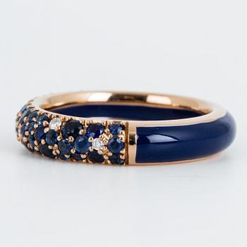 An enamel and brilliant cut diamond ring.