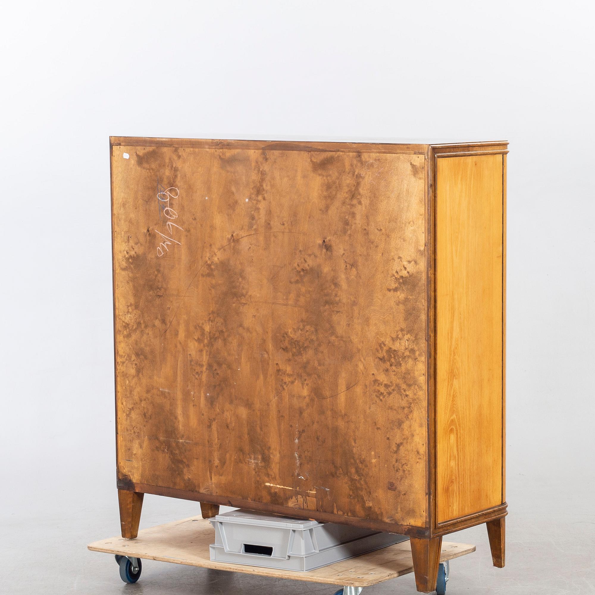 An 1940:s birch and beech cabinet 'Haga'.