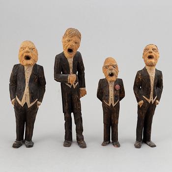 Four wooden sculptures by Axel Ericsson, signed and dated -29.