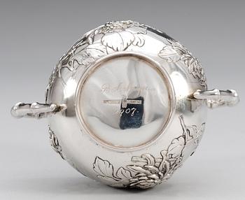 A Chinese silver five-piece tea set, Luen-Wo, Shanghai, circa 1875-1925. (5).
