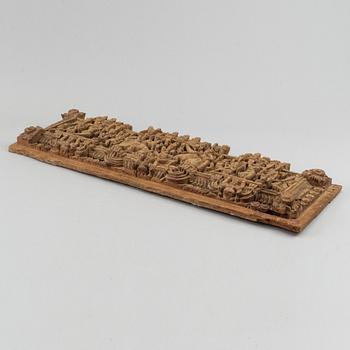 A carved wooden panel, India, circa 1900.
