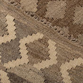 A carpet, kilim, around 254 x 160 cm.