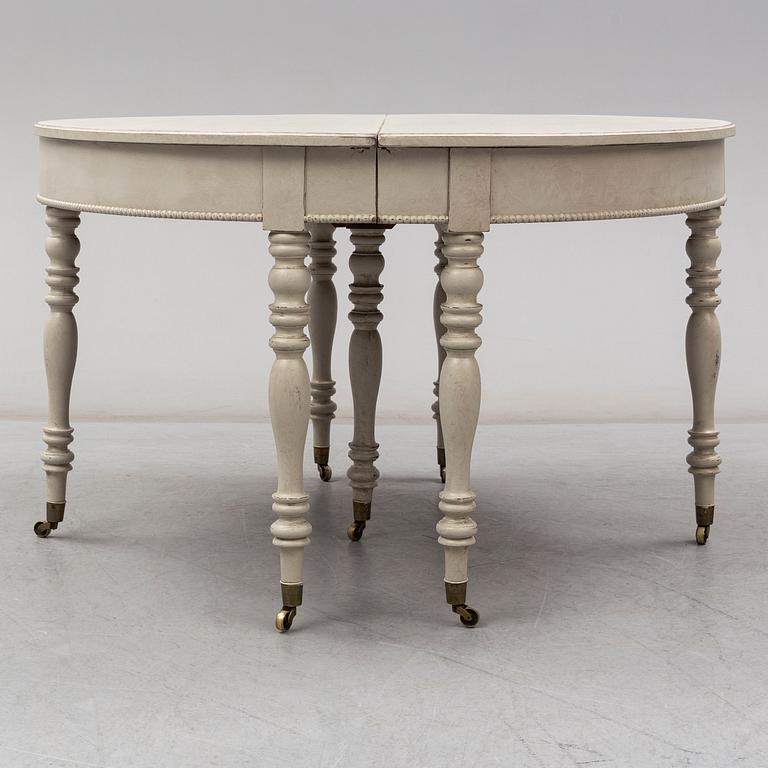 A mid 19th century painted dining table.