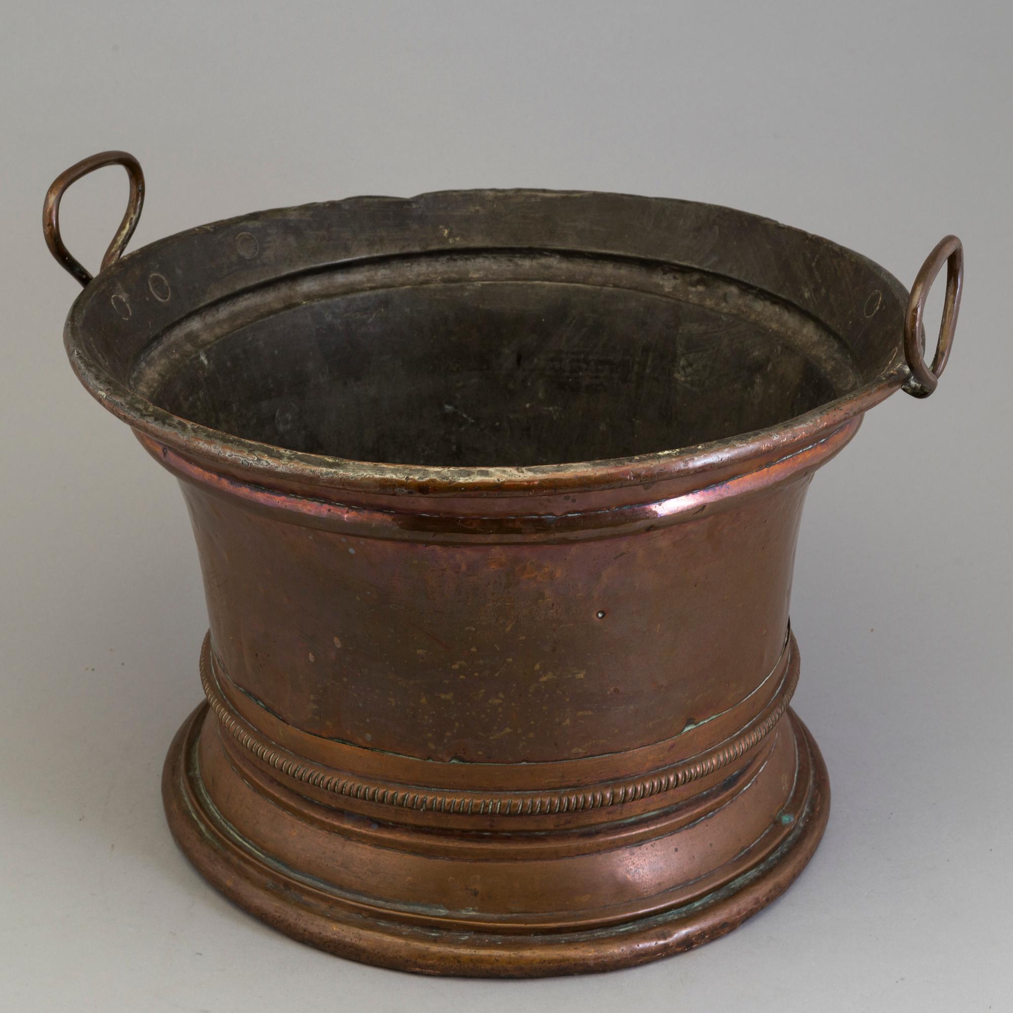 An 18th century copper wine cooler.