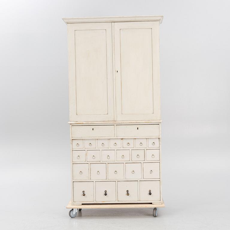 Drawer compartment with overhead cabinet, late 19th Century.