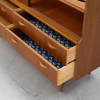 A teak veneered cabinet, 1960s.