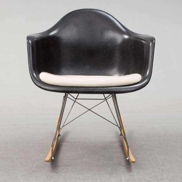 A 'Rocket chair' by Charles & Ray Eames, Herman Miller, late 20th century.