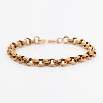 A 14K gold bracelet.