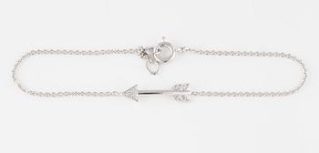 ARMBAND, 18K vitguld med briljantslipade diamanter ca 0.03 ct. Vikt 1,4 gram.